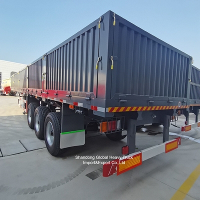 Półnaczepa z stalowym ogrodzeniem o trzech ośnach do transportu ładunków masowych